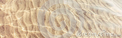 Closeup of sea ocean sand ground with waves ripples. Stock Photo