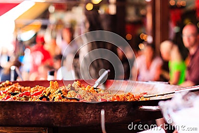 Closeup of Seafood Paella in a large frying pan at Chatuchak weekend market in Bangkok - Thailand Stock Photo