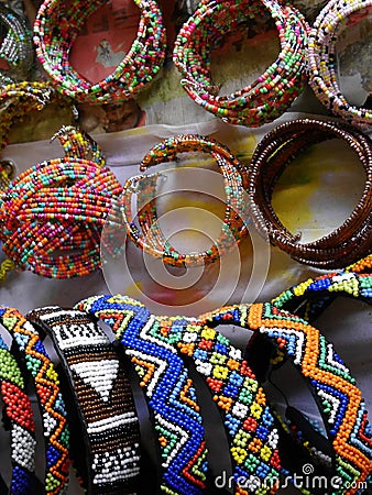 Closeup of selection of colourful beaded bangles on sale, South Africa Stock Photo