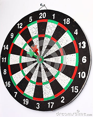 Closeup. several Arrows dart hitting the center of the target d Stock Photo