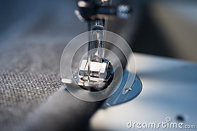 Closeup of sewing machine foot and needle Stock Photo