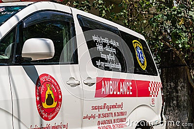 Closeup shot of an ambulance parked up outside Health Facility in Yangon, Myanmar Editorial Stock Photo