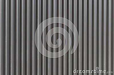 A closeup shot of automatic metal roller door used in factory, storage, garage, and industrial warehouse. Stock Photo