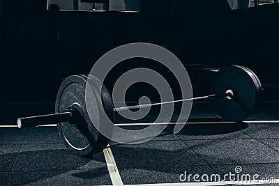 Closeup shot of barbell with weights on floor Stock Photo