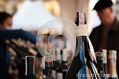 A closeup shot of bottles display at exhibitor stand at food and wine fair Stock Photo