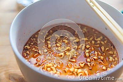 Closeup shot of a bowl of instant ramen noodle Stock Photo