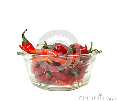 Closeup shot of a bowlful of chili peppers isolated on white background Stock Photo