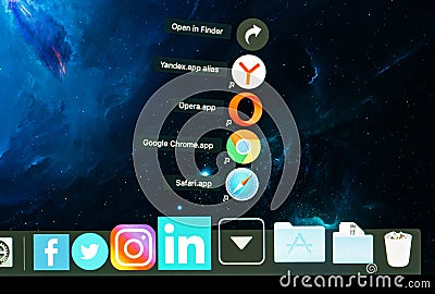 Closeup shot of browsers icons: Safari, Google Chrome, Opera and Yandex browser applications in dock of macbook, front view. Stack Editorial Stock Photo