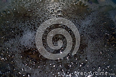 Closeup shot of bubbling boiling water Stock Photo