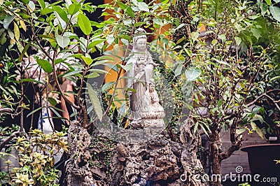 Closeup shot of Buddhist idols outside a temple in Vietnam Stock Photo
