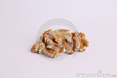 Closeup shot of a bunch of walnuts on a white background Stock Photo