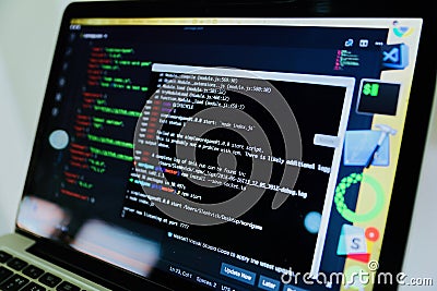 Closeup shot of coding on a laptop computer displaying a command prompt Stock Photo