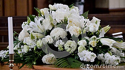 Closeup shot of a colorful casket in a hearse or chapel before funeral or burial at cemetery Stock Photo