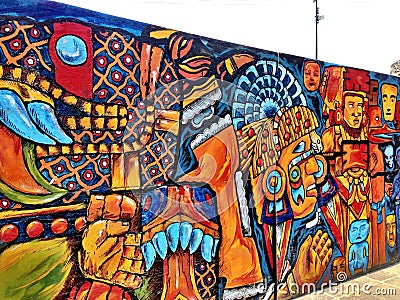 Closeup shot of colorful Mayan mural art in the downtown area of Mexico Editorial Stock Photo