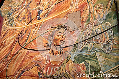 Closeup shot of a colorful painted USA Olympic Mural of a runner on a brick wall Editorial Stock Photo