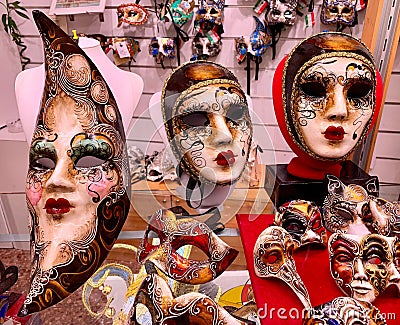 Closeup shot of decorated female carnival face masks for sale in a shop Editorial Stock Photo