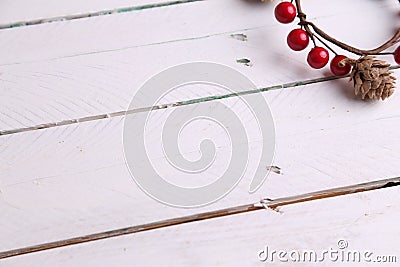 Closeup shot of a decorative wooden trinket isolated on a white wooden surface Stock Photo