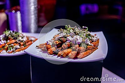 Closeup shot of different meals served at a wedding reception Stock Photo