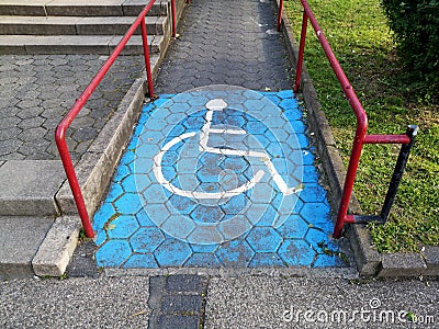 Closeup shot of disable, handicap sign on the road Stock Photo