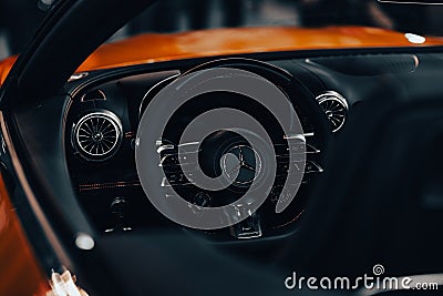 Closeup shot of the driving wheel of the Mercedes-Benz AMG SL with blur background Editorial Stock Photo