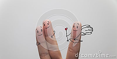 Closeup shot of finger couple in love, with cupid finger aside Stock Photo