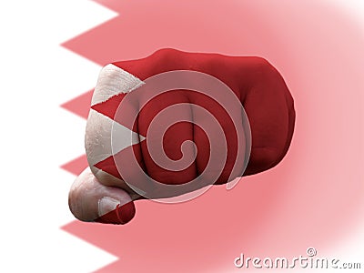 Closeup shot of a flag of Bahrain painted on male fist Stock Photo