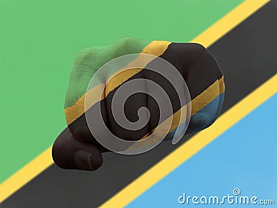 Closeup shot of a flag of Tanzania painted on male fist Stock Photo