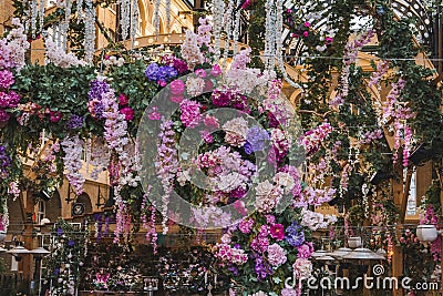 Closeup shot of flower decoration at entrance of Hays Galleria in London Stock Photo