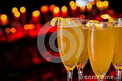 Closeup shot of glasses of alcohol drinks with lemons Stock Photo