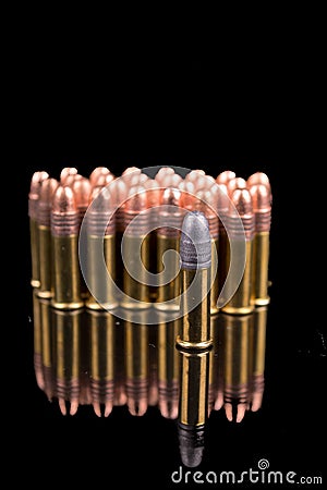 Closeup shot, group of bullets on black background Stock Photo