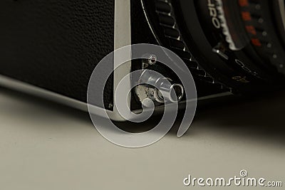 Closeup shot of a Hasselblad retro vintage camera on a white surface Stock Photo