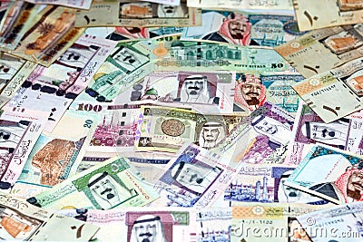 Closeup shot of a heap of Saudi Arabia riyals money banknotes on a table Stock Photo