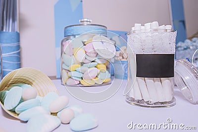 Closeup shot of jars filled with decorative shells for a wedding table Stock Photo