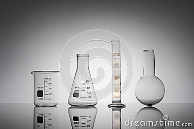 Closeup shot of laboratory flasks, beaker, and tube Stock Photo