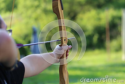 Closeup shot of a man practicing archery - concept of Archery Stock Photo