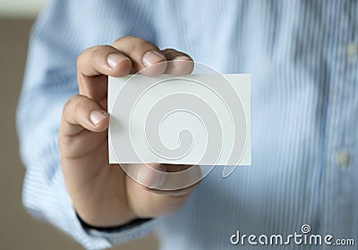 Closeup shot man show white business card plastic bank-card des Stock Photo