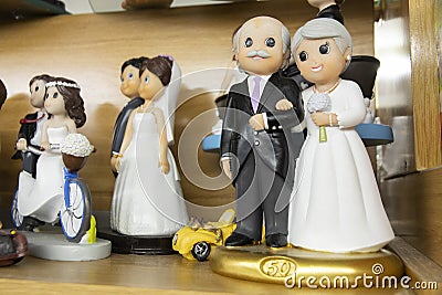 Closeup shot of old bride and groom figurines for fifty-year wedding anniversary Stock Photo