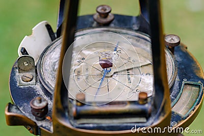 Closeup shot of an old fashioned surveyors tool for measuring land Stock Photo