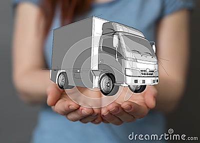 Closeup shot of a person presenting the virtual projection of a silver truck Stock Photo