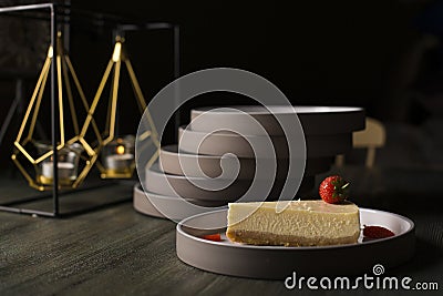Closeup shot of a piece of cheesecake with a strawberry on top Stock Photo