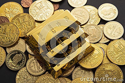 Closeup shot of a pile of shiny gold coins and bars Stock Photo