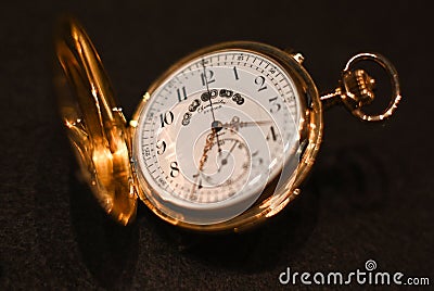 Closeup shot of a rare pocket watch in good condition found in an antique store Editorial Stock Photo