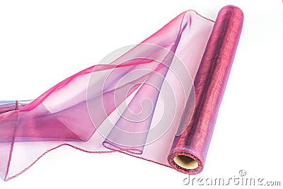 Closeup shot of a roll of pink fabric isolated on a white background Stock Photo