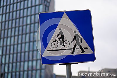 Closeup shot of a square road sign indicating the passage for pedestrians and cyclists Stock Photo