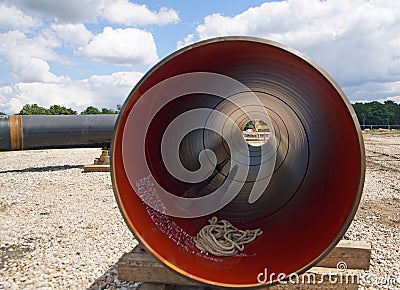 Closeup shot of steel casing pipe on the ground Stock Photo
