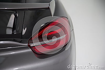 Closeup shot of the tail light of a modern black luxury car Stock Photo