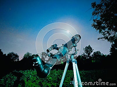 Closeup shot of a telescope in the beautiful forest Stock Photo