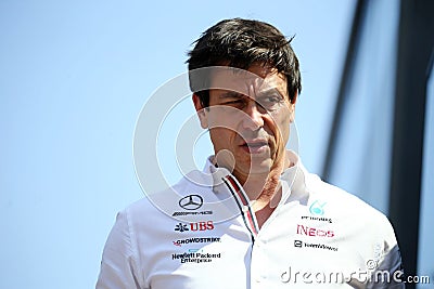 Closeup shot of Toto Wolff at an F1 competition with an exasperated expression Editorial Stock Photo
