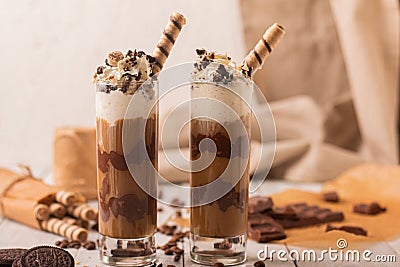 Closeup shot of two chocolate blended ice lattes decorated with sweets Stock Photo