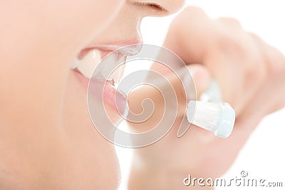 Closeup shot of woman brushing teeth Stock Photo